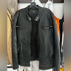Men’s Black Rivet leather jacket!! Worn but in amazing condition!!